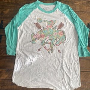 Woman’s Ariat and crazy train